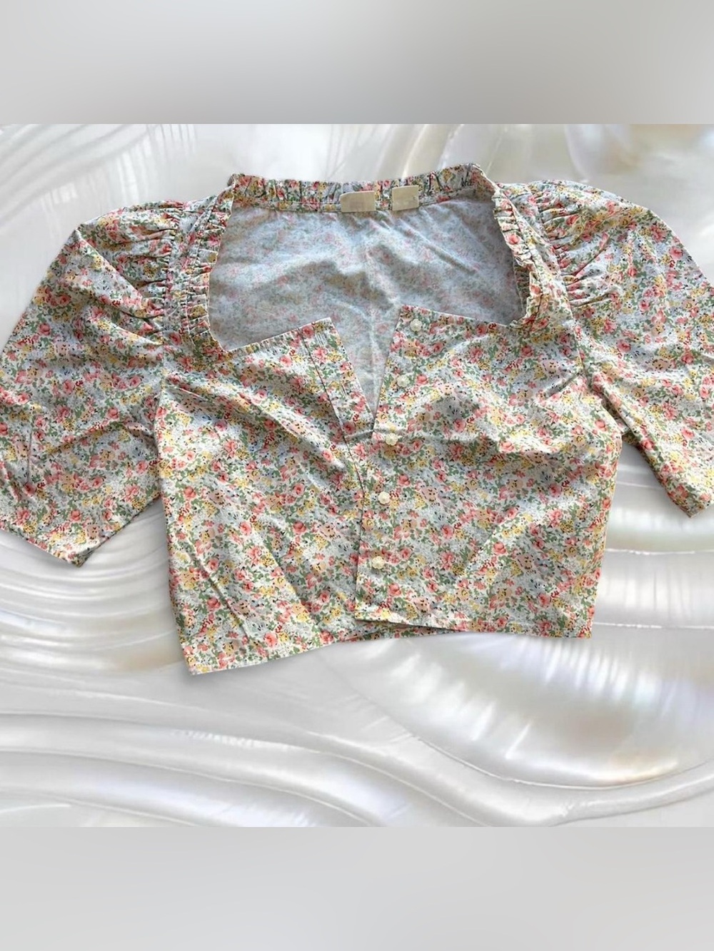 Levi’s Floral blouse with ruffle details and flower button up front